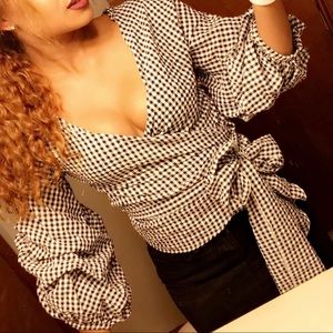 Black and White striped shirt.